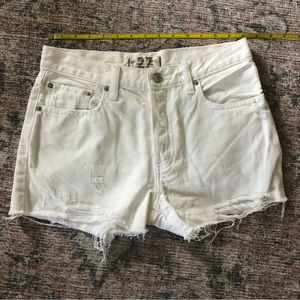 Free People White high waisted cut off denim shorts with button down fly